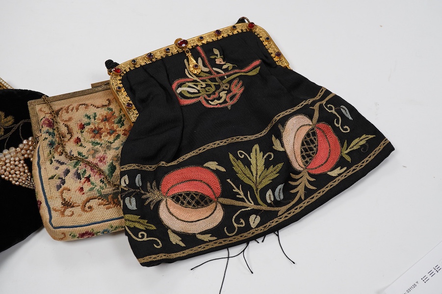 Four vintage embroidered evening bags, with embroidered Arabic calligraphy and purses together with a pair of baby shoes